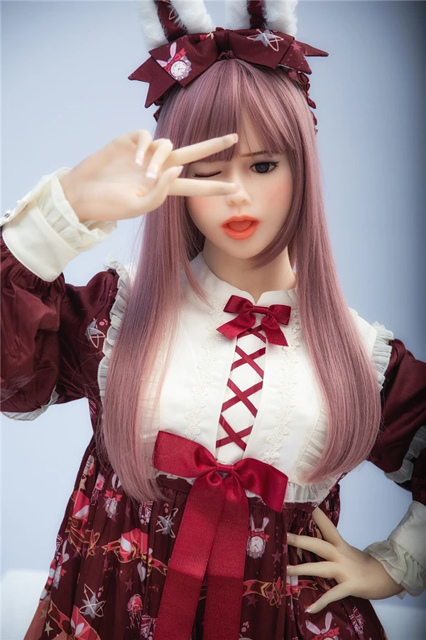 Bezaubernde lebensgroße Della-Puppe mit rosa Haaren, Maße: 156 cm